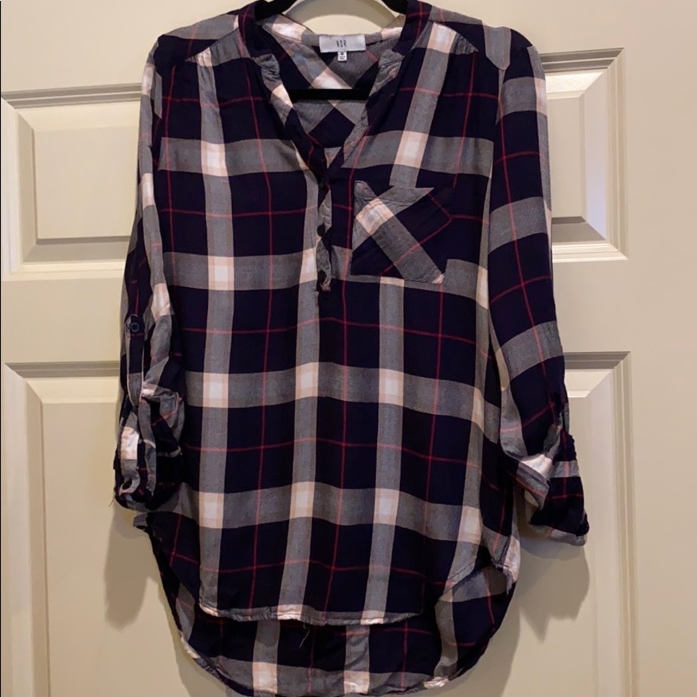 Shirttail plaid casual too. It is navy w/ pink